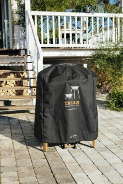 IGNIUM Abdeckhaube Schwarz Vaude -Grill Verkaufsgeschäft TARAN Grill Abdeckhaube Moodbild Hersteller Ignium